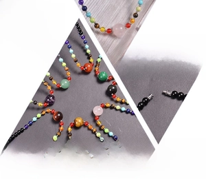 Detailed view of handmade 6mm chakra stone necklace featuring tiger eye and rose quartz beads