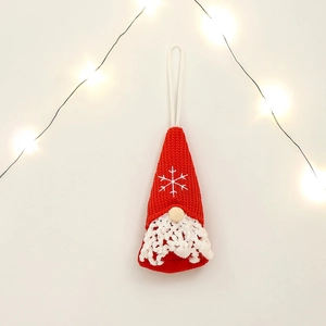Christmas faceless gnome ornament with red knit hat and white snowflake embroidery