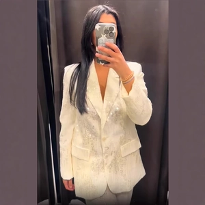 Completo blazer di lusso con paillettes da donna con giacca a revers e pantaloni bianchi