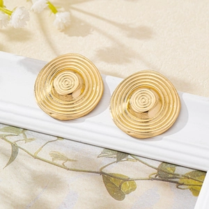 Elegant gold alloy sunflower earrings with concentric ripple texture on white frame