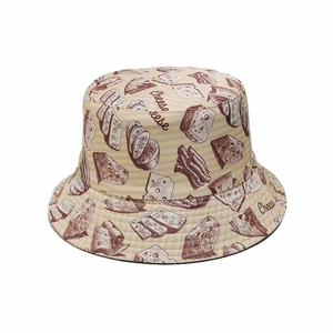 Close-up of cheese and bacon print on yellow striped cotton bucket hat for women