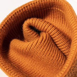 Classic caramel ribbed knit beanie hat for winter outdoor warmth and stylish texture
