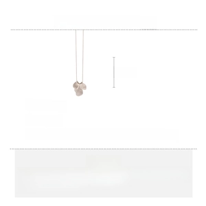 Detailed view of alloy long chain necklace with three irregular metallic petal pendants