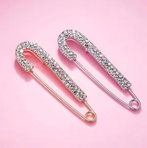 Sparkling crystal safety pin brooch set in silver and gold plating for sweaters