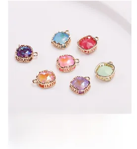 Detail of colorful faceted crystal pendants with gold copper hollow bird nest lace frames