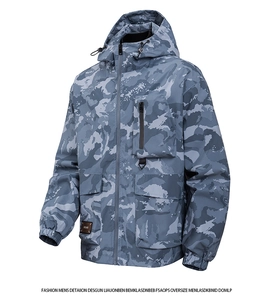 Detail of men's camouflage windbreaker with waterproof fabric and leather logo patch