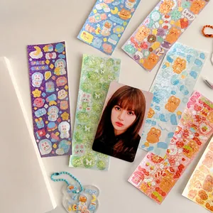 Close-up of cute cartoon laser stickers for DIY scrapbooking and star card decoration
