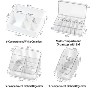 Transparent acrylic eyelash organizer box with lid and multiple slots for professional lash tech
