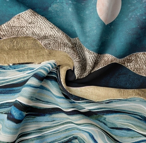Detail of abstract landscape tapestry showing soft fabric texture and blue gold flowy print