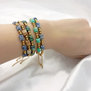 Bohemian stacked bracelet set with colorful natural stones and gold metal beads