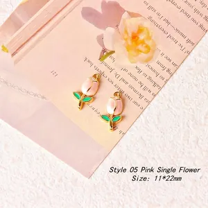 Detailed view of pink tulip pendants for DIY jewelry making with dimensions 11x22mm