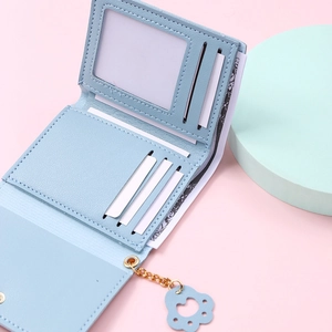 Light blue PU leather tri-fold wallet featuring clear ID window and cute cat paw charm
