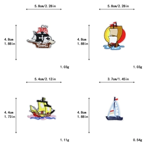 Detailed size and weight measurements of four nautical embroidery patches for clothing