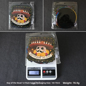 Day of the Dead spiral hanging decorations with sugar skull and marigold patterns