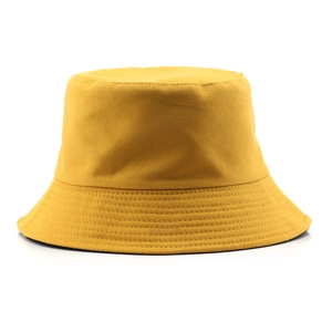 Solid yellow cotton bucket hat with parallel stitched brim and minimalist outdoor design