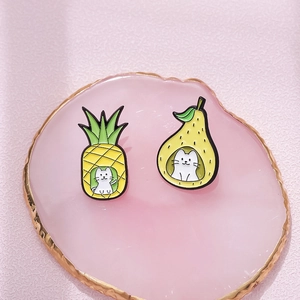 Enamel cat brooches set featuring pineapple and pear fruit designs with white kittens