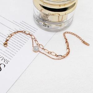 Double-layered rose gold stainless steel bracelet with zircon disc and lobster clasp
