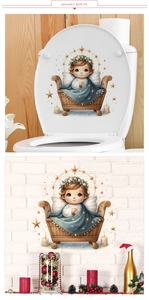 Detail of Christmas nativity window decal showing baby Jesus in cradle on a white wall
