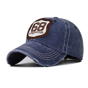 Distressed navy washed cotton baseball cap with 68 shield embroidery and contrast stitching