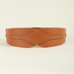 Detail of tan elastic waist belt featuring diamond stitching and metal snap closure