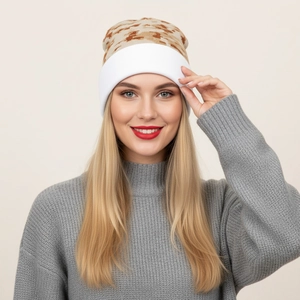 Close-up of thick camo knit beanie texture with a wide white ribbed cuff detailing