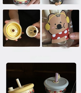 Detail view of cartoon glass tumbler showing 3D bear print and tea filter infusion component
