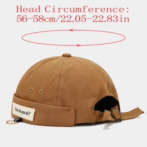 Detail view of adjustable metal buckle and size label for 56-58cm brimless docker hat