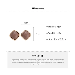 Detail view of square leather earrings with size 2.5cm and alloy material specs