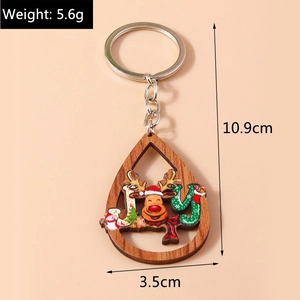 Détail du porte-clés de Noël en bois en forme de goutte avec renne et dimensions indiquées