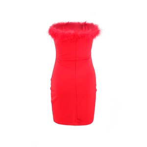 Detail of red tube dress featuring fluffy feather trim along the neckline