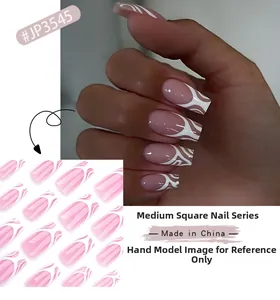 Detail of medium-long square press-on nails with pink base and white abstract wavy lines
