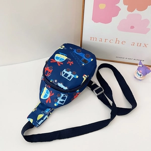 Detail of navy blue kids chest bag with cartoon car and helicopter prints