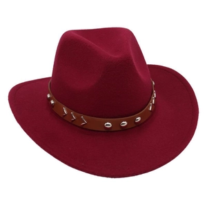 Detail of burgundy wool western cowboy hat featuring a studded brown leather band
