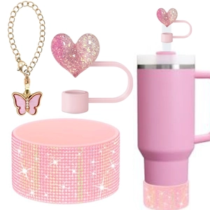 Pink rhinestone tumbler sleeve with glitter heart straw cover and butterfly keychain set