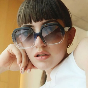 Retro oversized polygon sunglasses with black-to-clear gradient frame and gradient lenses