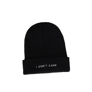 Black knit beanie with I DON'T CARE white embroidery for men and women