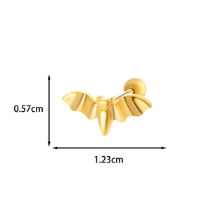Detailed macro view showing the gold bat wing ear stud with dimensions 0.57cm by 1.23cm