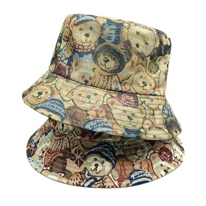 Foldable jacquard sun hat featuring vintage bear patterns in various retro color blocks