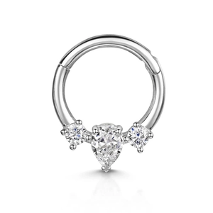 Detailed macro view of S925 silver nose ring with sparkling pear and round crystals