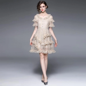 Champagne lace mini dress with layered ruffle skirt and elegant pearl button details