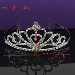 Detail view of silver rhinestone tiara with comb showing size 13x3.5cm and weight 36g