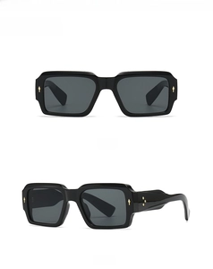 Front and 45-degree side view of black square sunglasses with golden star rivets