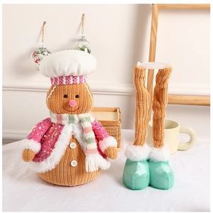Standing plush gingerbread man doll with sequined cape and retractable legs for Christmas decor