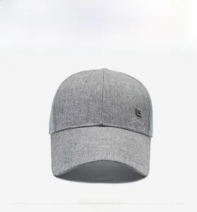 Detail of grey baseball cap showing textured fabric, breathable mesh and China embroidery