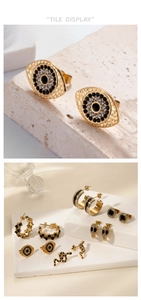 Detailed view of gold-plated stainless steel earrings with crystals in various shapes