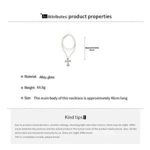 Detail view of multi-layer crystal bead necklace with large cross pendant and dimensions