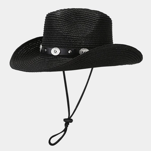 Close-up of black straw cowboy hat with silver metal studs and adjustable chin strap