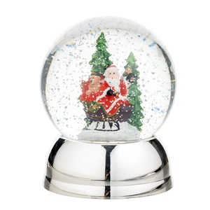 Christmas snow globe with Santa and tree on silver metal base for holiday decoration