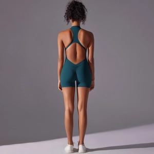 Detail of teal backless yoga romper with scrunch butt design and racerback cutout