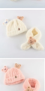 Detailed close-up of soft plush bear hat and scarf set for toddlers in pink and white